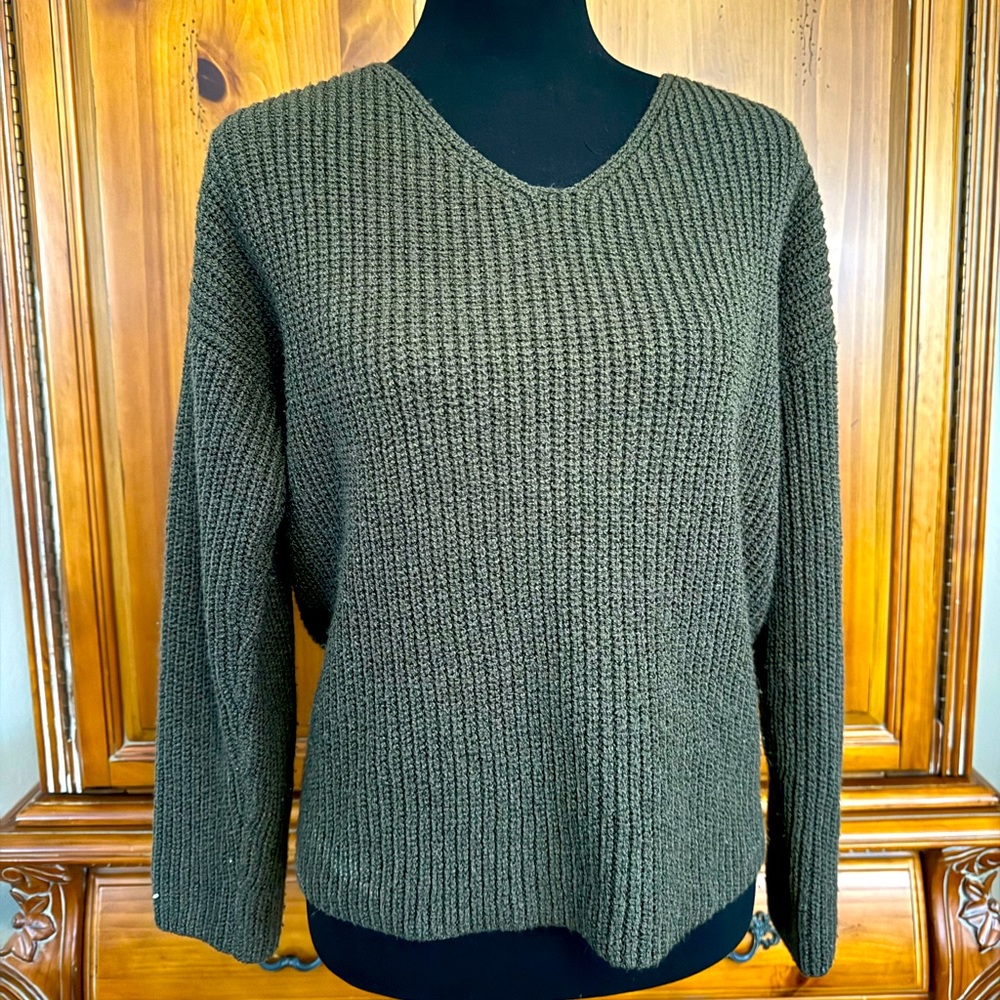 Olive green knit sweater with twist on back